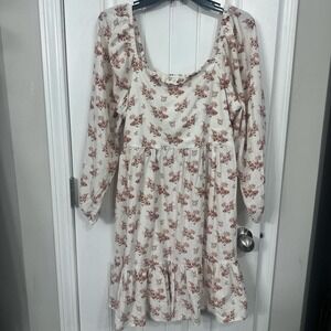 Cottagecore floral mini prairie dress with a smocked back. Large